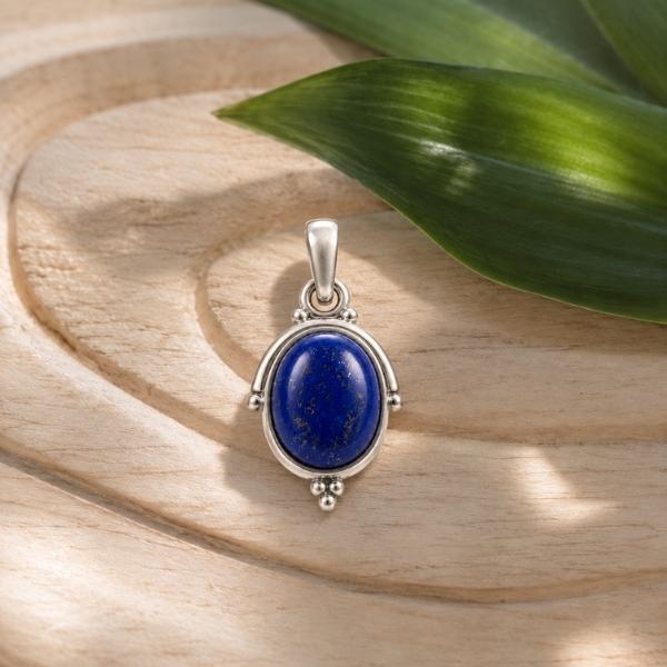 PENDENTE CON PIETRA OVALE CABOCHON LAPISLAZZULI  E CORNICE A FILO ARGENTO 925
